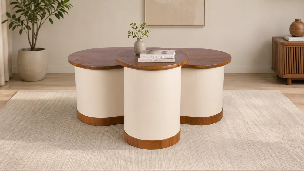 A cream and walnut Alfa centre table on a rug