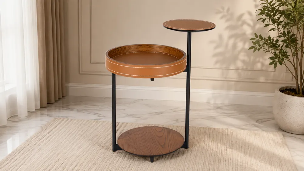 A two-tier tan side table beside a curtain