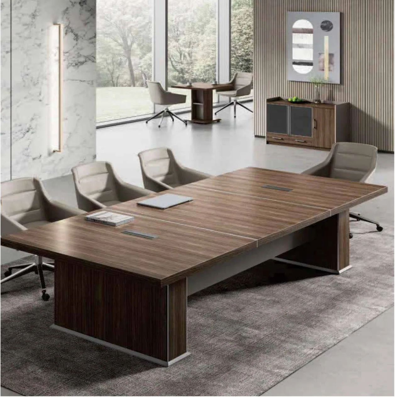 A walnut meeting table with leather chairs around it, in front of a window